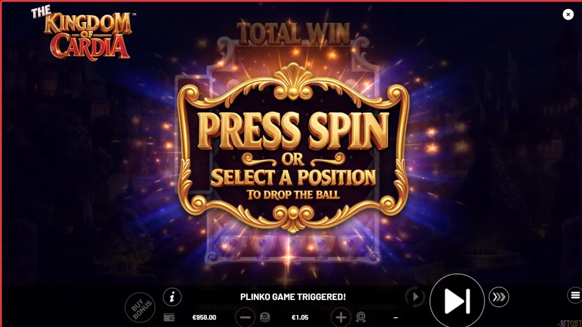 The Kingdom of Cardia slot game interface featuring fantasy garden and playing card symbols.